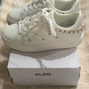 Aldo Women's White Sneakers with Gold Chain Detail